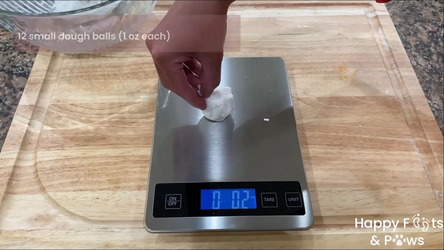 Weighing the dough before forming the dough balls