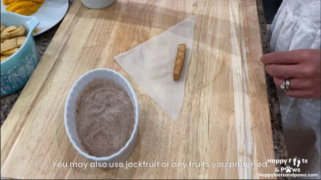 woman adding plantain banana to egg roll wrapper