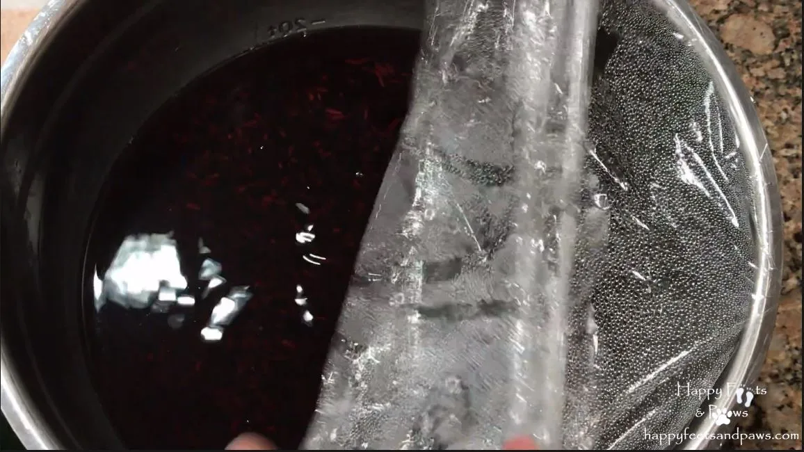 black rice in a bowl with plastic wrap on top for biko recipe