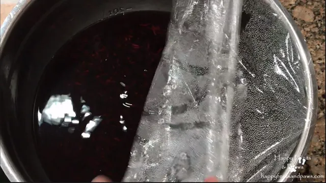 black rice in a bowl with plastic wrap on top for biko recipe