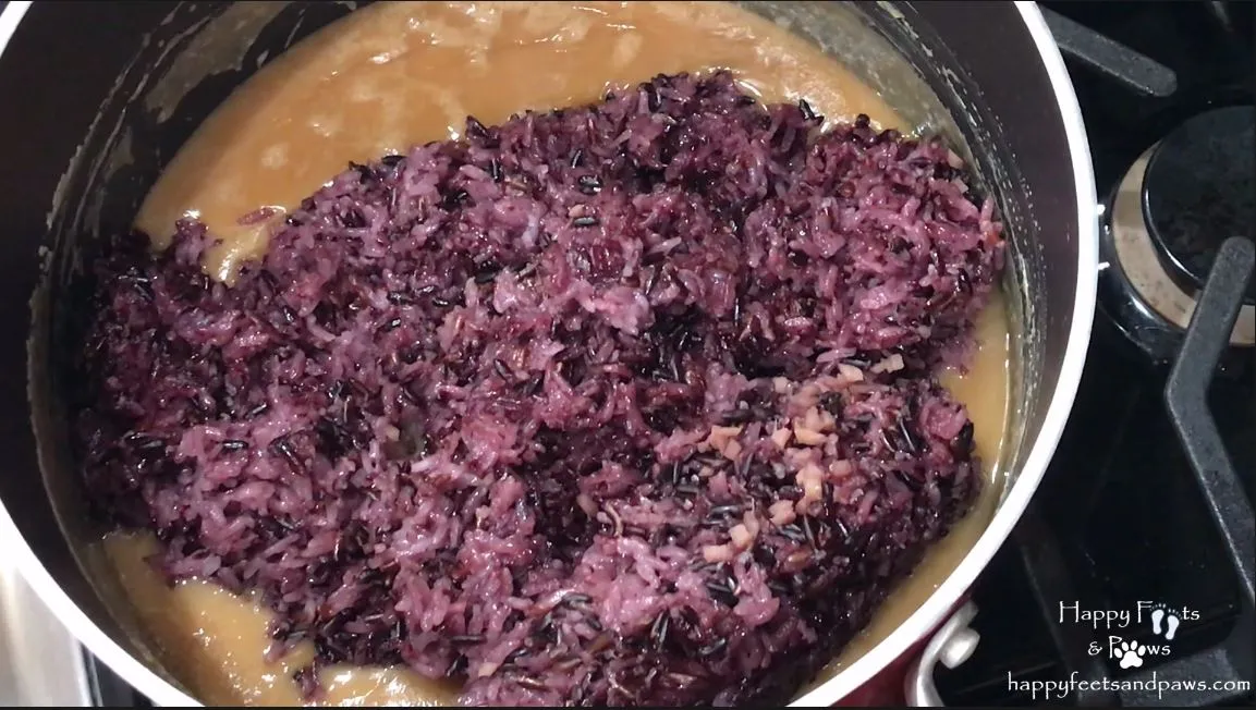 black rice being added to coconut milk for biko recipe