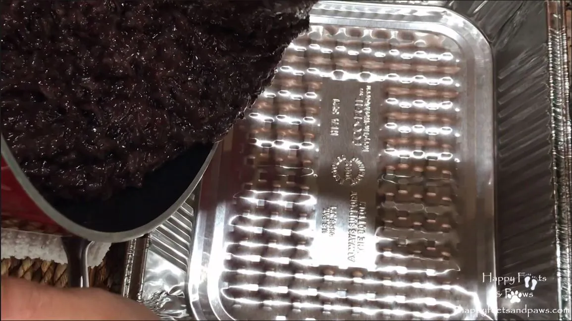 black rice being added to tin pan for biko recipe