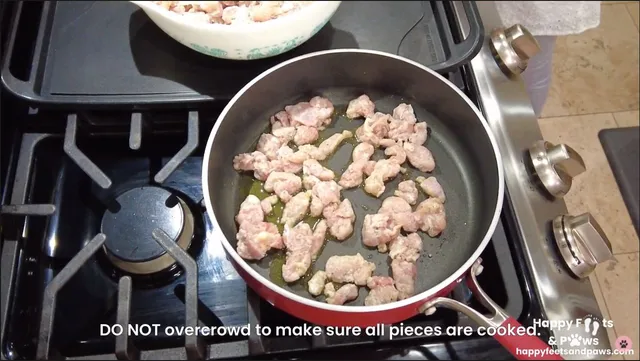 chicken cooking in a pot for black pepper chicken recipe