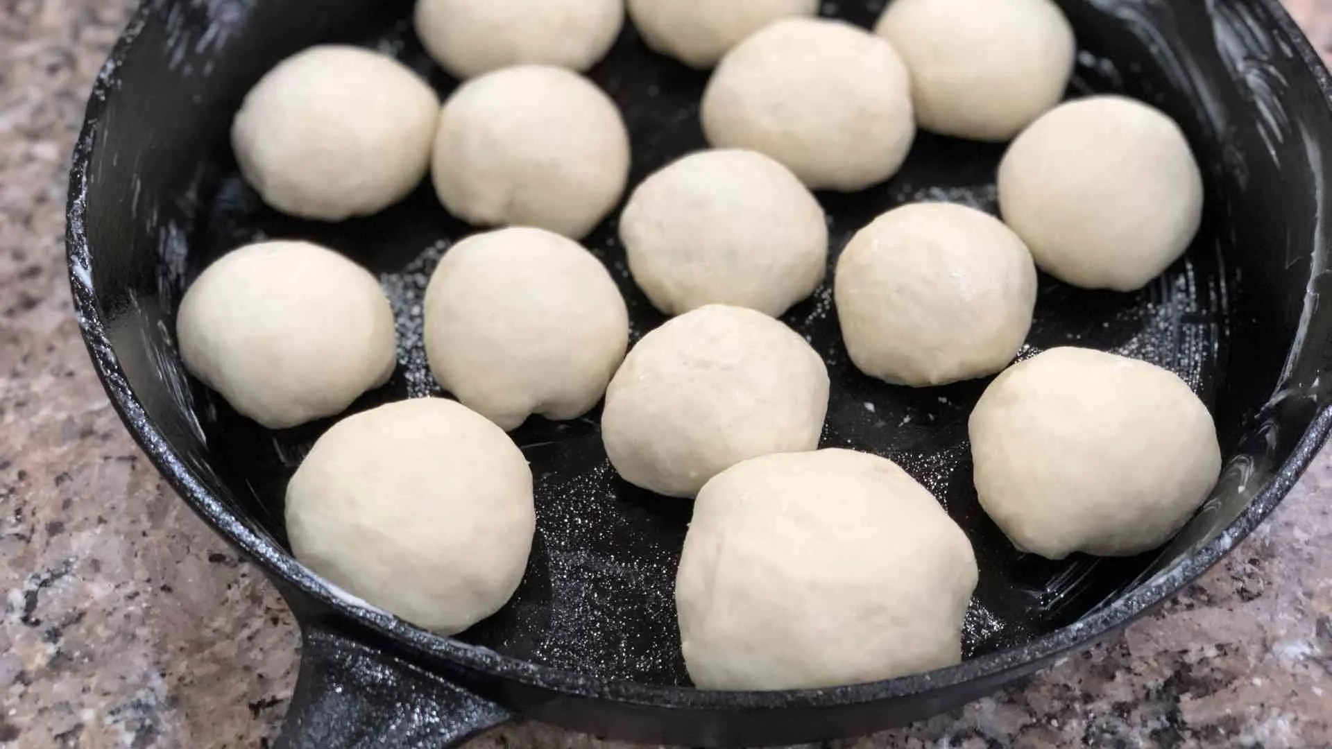Place dough in the iron skillet – How To Make Cast Iron Bread Rolls