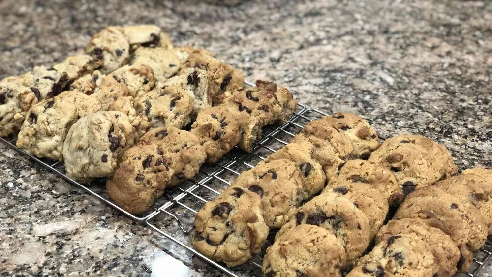 chocolate chip cookies cooling on a rack