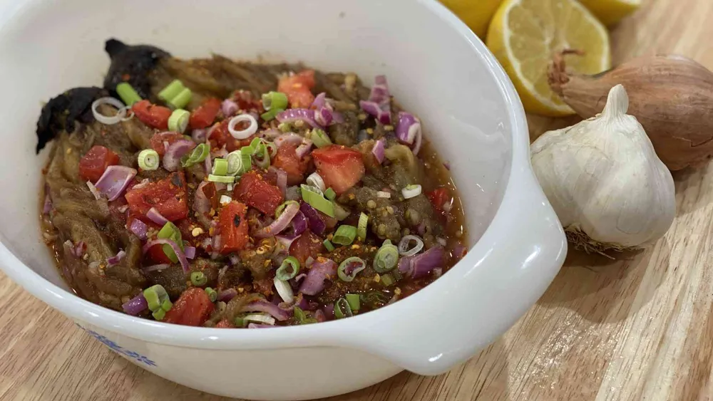 Filipino grilled eggplant salad in a bowl