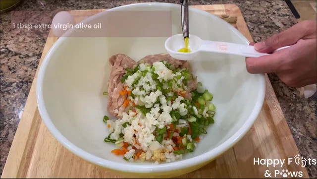 Mixing meat, onions, carrots and other ingredients in a bowl for lumpia shanghai