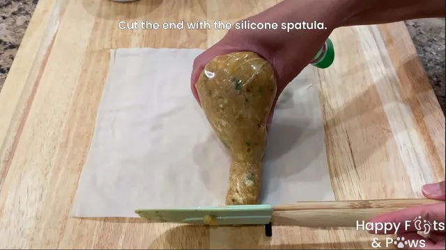 placing lumpia shanghai meat mix into a wrapper with a bag for no mess