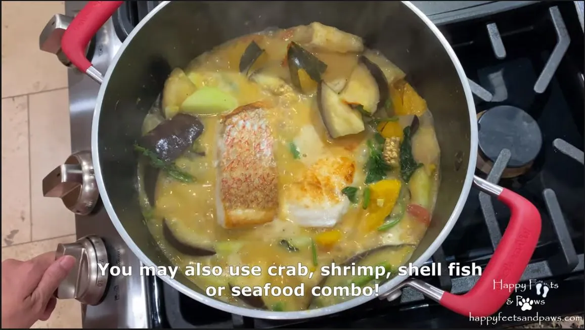 ginataang isda in a pot on a stove