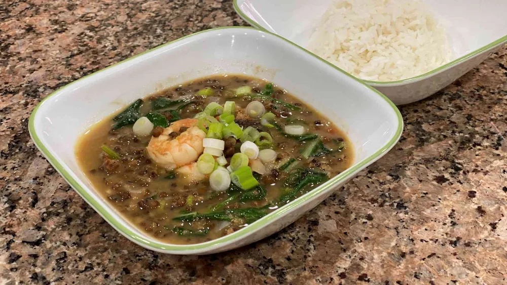Filipino Ginisang Munggo Mung Beans in a bowl with rice