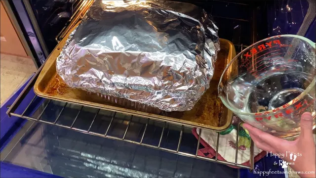 ham being put into oven