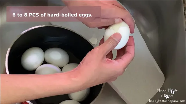 peeling eggs for Filipino Adobo recipe.