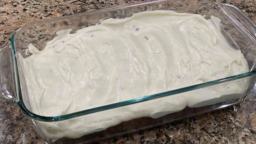 Zucchini Bread in glassware with cream cheese frosting